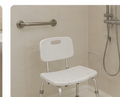 Shower chair with non-slip mat inside a walk-in shower
